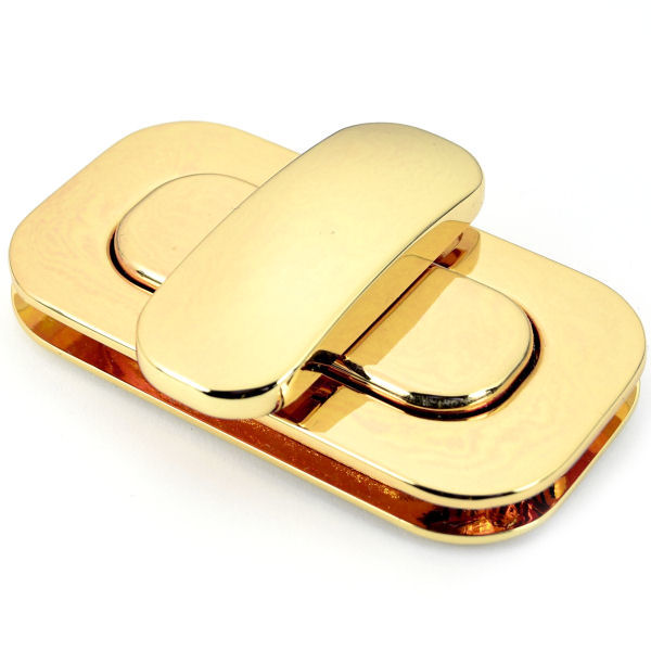 D-580-go-8-TV-600-XXL-Drehverschluss-massiv-gold-Taschen-Mappen-Lederwaren DESIGN-Drehverschluss 65 x 35 mm, gold pol.